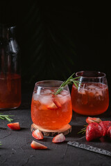 Iced lemonade with strawberry and rosemary