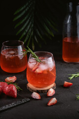 Iced lemonade with strawberry and rosemary