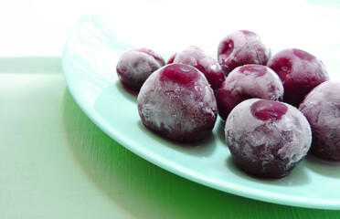     frozen berry cherries covered with hoarfrost