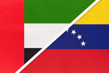 Fototapeta premium United Arab Emirates and Venezuela, symbol of national flags from textile. Championship between two countries.