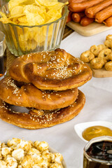 Traditional oktober fest food. German pretzels with various snack