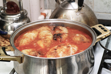 Preparing stuffed cabbage, Polish cuisine specialty.