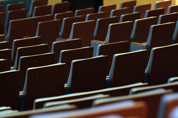 Obraz premium Concert hall seats made of wood and blue upholstery