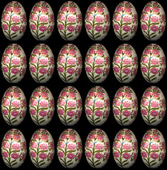 Closeup of foil wrapped chocolate easter eggs on a plain background