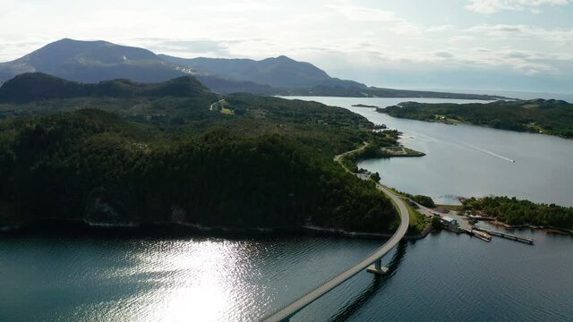 Aerial view of road bridge connecting Stabblandet island with Ertvagoya island in More og Romsdal county, Norway.
