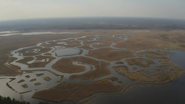 Lowering on geometrical figures on lake in Latvia