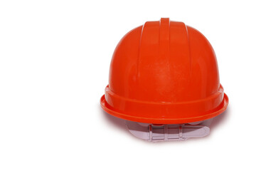 Fototapeta premium Red plastic safety helmet isolated on white background.