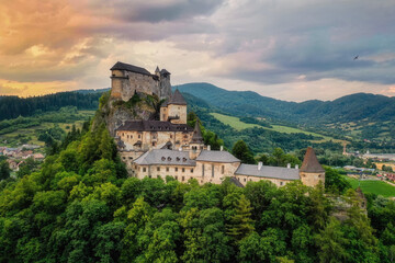 Fototapeta premium Orava Castle on a huge cliff above the river valley