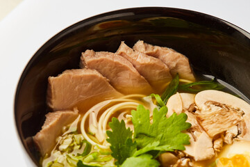 Japanese ramen soup with pork, egg, chives  - traditional Asian dish