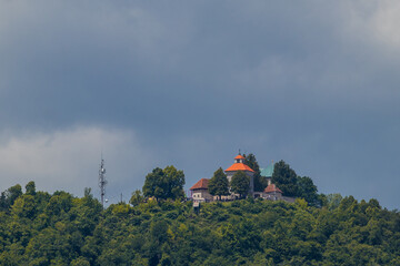 Telephoto view of church on Smarna gora or Saint Mary, a hill next to the Ljubljana, capital of Slovenia