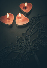 Beautiful mask and candles. candles in the form of hearts. Romantic evening. The Sacrament.  - 361482322