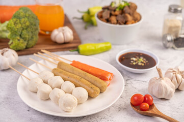 Pork meatballs on a white plate.
