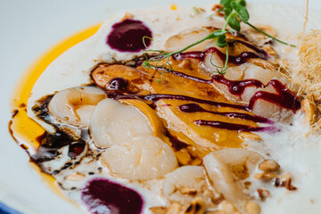 Scallop ceviche and foie gras with hazelnut, ready to serve.