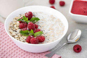 milk oatmeal with berries, honey and berry mousse
