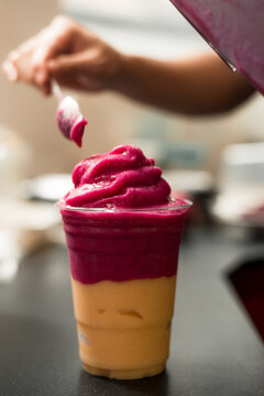 Dragonfruit And Mango Smoothie In Plastic Cups