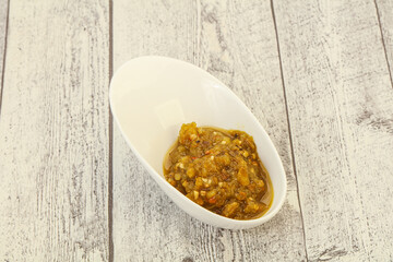 Green spicy sauce in the bowl