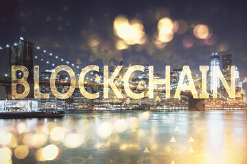 Multi exposure of cryptocurrency theme hologram drawing and city veiw background. Concept of blockchain and bitcoin.