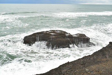 Piha beach coastal rock formation