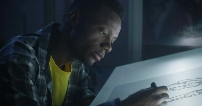 Male graphic designer drawing concept art