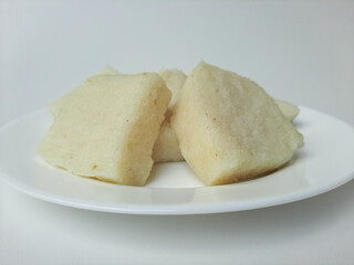 Jadah ketan, is a traditional snack from Indonesia. Made from sticky rice and grated coconut....