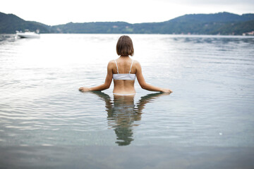 Young woman in the lake