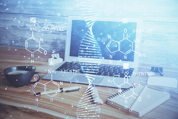 Desktop computer background and DNA drawing. Double exposure. Science concept.