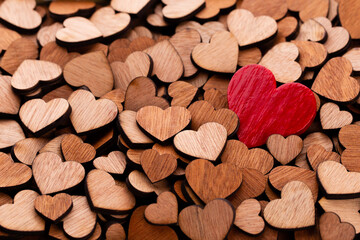 Red heart, valentine day greeting card. Wooden hearts background.