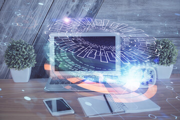 Double exposure of computer and technology theme hologram. Concept of freelance work.