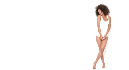 Fantastic afroamerican girl with tiny body posing in white underwear.