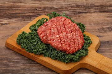 Raw beef burger cutlet for cooking