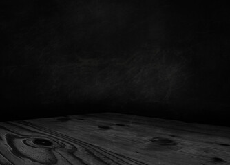 Wooden table on a dark background with space for your text. 3D illustration