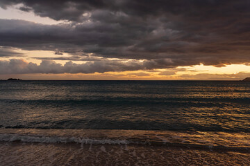 grey cloudy sunset over sea