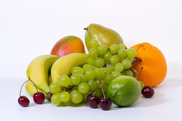 Assortment of fresh ripe exotic fruits on a light background. Healthy eating concept.