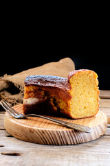 Homemade carrot cake on wooden board