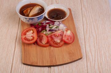 Cooking ingredient,on a chop board,isolated over wooden background