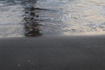Fototapeta na wymiar human shadow in the sea