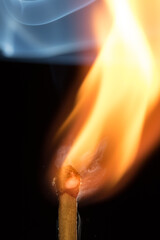 Flash of flame on a match. Close-up. Macro photography.