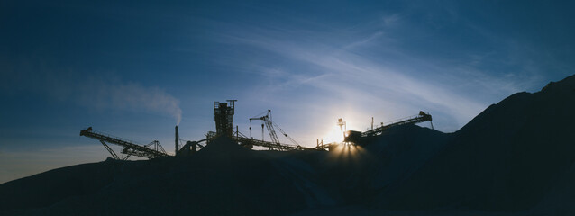 Industrial landscape. Panorama constructions of mining and processing plant on the background of...
