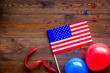 4th July celebration. American flag on wooden backrgound top view copy space