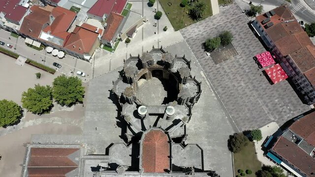 Batalha, Portugal - June, 29, 2020: Aerial top view of Unfinished chapels at Batalha Monastery, Leiria, Portugal. Dominican convent with Manueline style architecture. Downward camera movement.