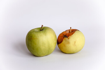Green apple rotten on isolated background
