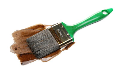 Brush with protective wood layer coating liquid isolated on white background