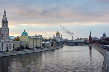 Fototapeta na wymiar Moscow river in evening. Kremlin and Cathedral of Christ the Savior