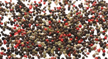 Colorful peppercorn mix, pepper pile isolated on white background