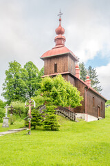 Fototapeta premium View at the Wooden church of Protection of the Blessed Virgin in Varadka, Slovakia