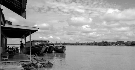 boats in the harbor in black and white photo