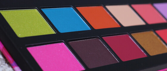 Colorful Cosmetic Pigment Palettes and Various Cosmetics