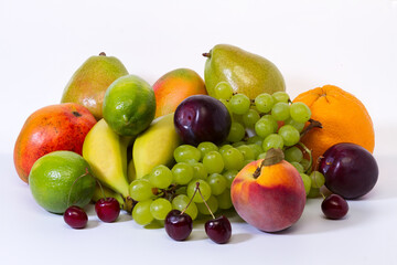 Assortment of exotic fruits on a white background.  The concept of a healthy lifestyle.