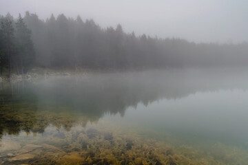 Naklejka na ściany i meble Misty morning on the lake