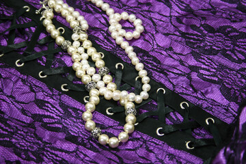 Lingerie and Pearls Background Purple and Black Lace